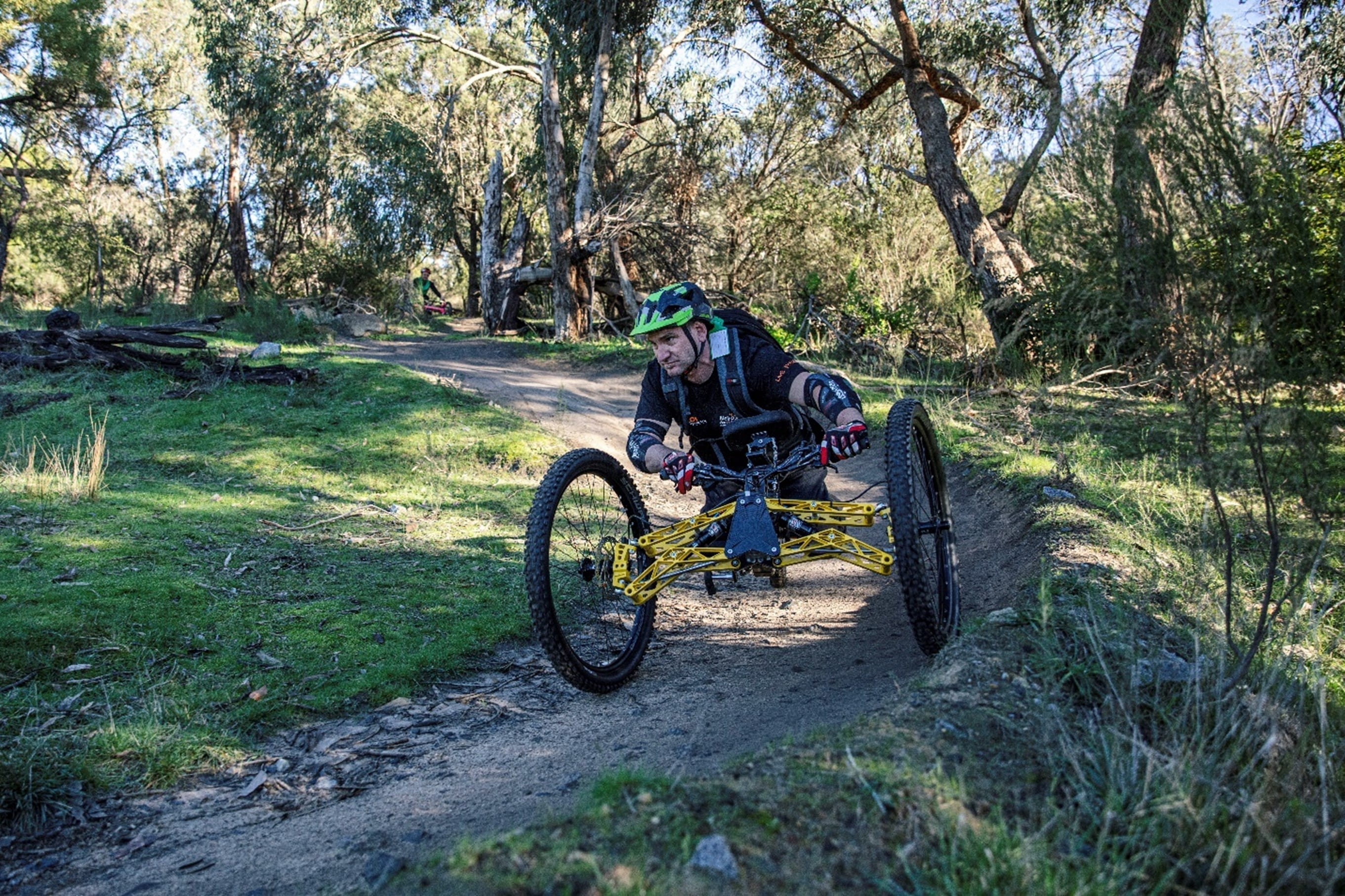 a person is riding their bike low to the ground